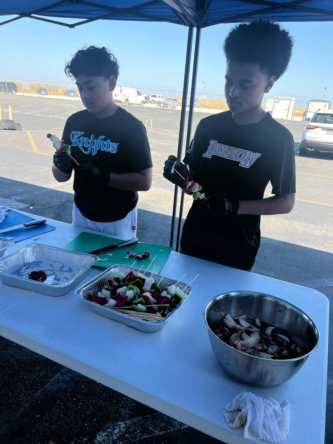 Students practicing cooking and food preparation skills