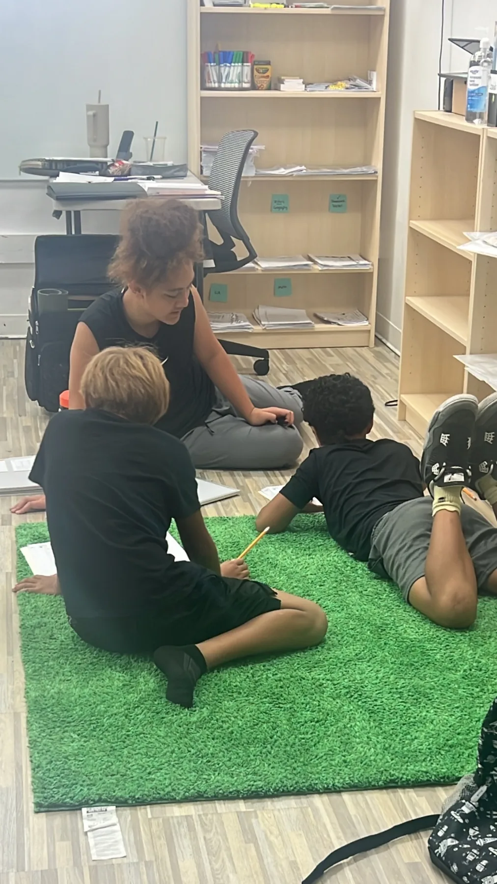 Students working together in a relaxed small-group learning space